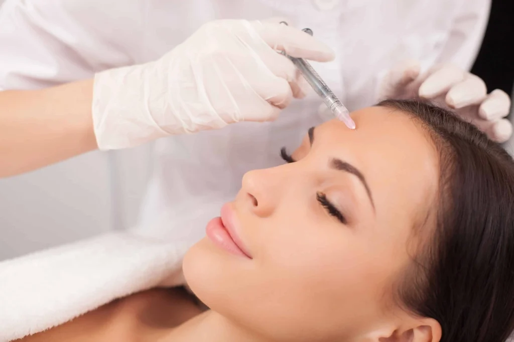 Young women receiving Dysport at The Alchemy Clinic in Manchester, NH