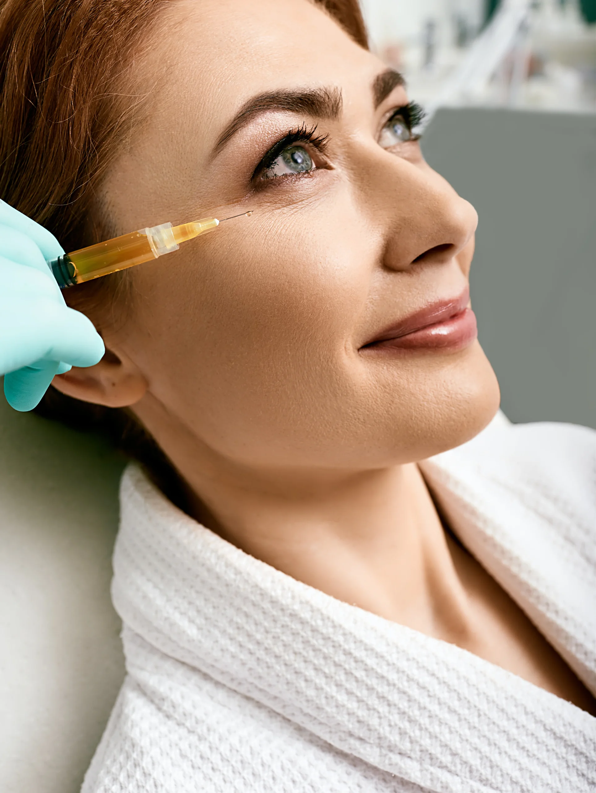 A female getting injection at The Alchemy Clinic in Manchester, NH