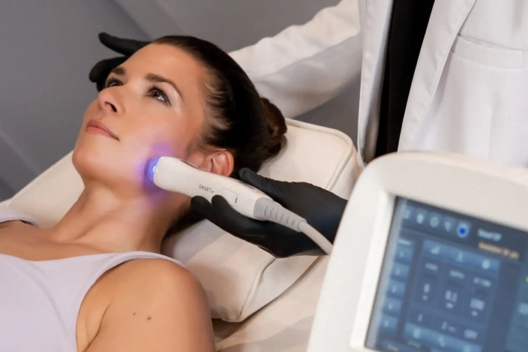Young women receiving VirtueRF FACE Service in Manchester, NH at The Alchemy Clinic