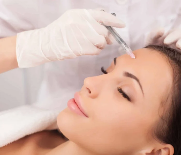 Young women receiving Dysport at The Alchemy Clinic in Manchester, NH